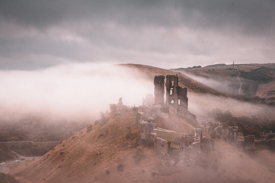 Mist surrounding corfe castle in autumn