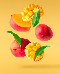 Fresh ripe mango falling in the air