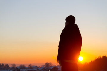 Traveler watching the sunset