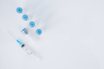 Vaccination, covid, syringe and amula layout