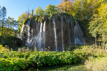 Exotic waterfall and lake landscape of Plitvice Lakes National Park, UNESCO natural world heritage and famous travel destination of Croatia