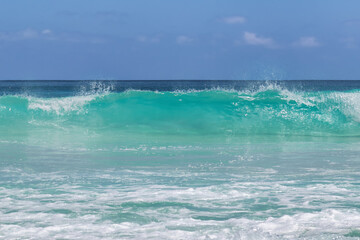 Fototapeta na wymiar Sea wave in tropical beach background.