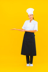 Portrait beautiful young asian woman in chef or cook uniform with hat