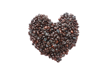 Heart shaped dark roasted coffee beans on a white background.