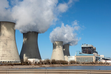 Under the background of sunny day, the appearance of a power plant is very beautiful