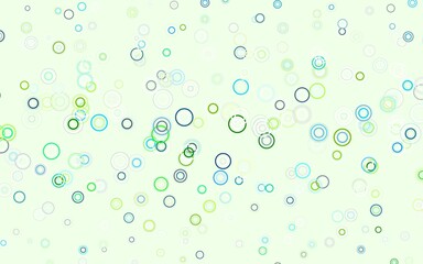 Light Green, Yellow vector background with bubbles.