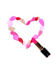 Valentine's Day background. Red and pink lipstick smeared in the shape of heart. Isolated on white background. Cosmetic products