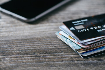 A closeup of many plastic bank cards