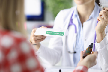 Doctor writes the patient prescription for marijuana