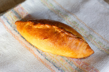 Fresh traditional russian buns on a tray