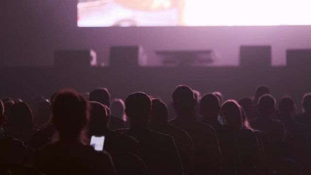 People watching movie in cinema
