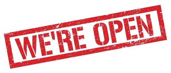 WE'RE OPEN red grungy rectangle stamp.