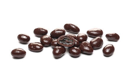 Chocolate coated raisins pile isolated on white background