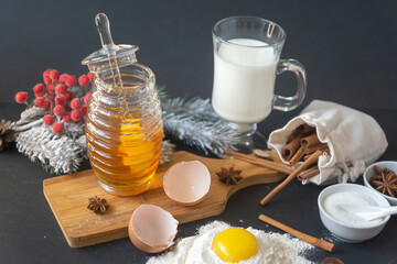 When preparing baked goods or desserts, all ingredients and spices are intended for a home baker, honey, milk, eggs, sahor, flour, cinnamon, star anise.