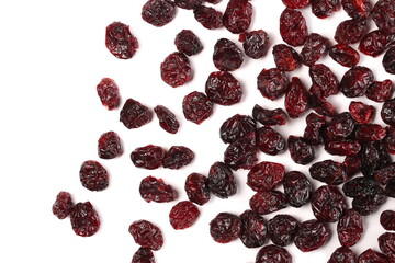 Dried cranberries pile isolated on white background, top view