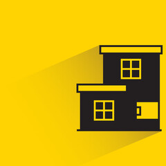 house with drop shadow on yellow background