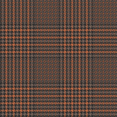 Glen plaid pattern in brown and orange. Dark seamless hounds tooth tweed tartan check plaid for coat, skirt, trousers, jacket, or other modern winter fashion fabric print.