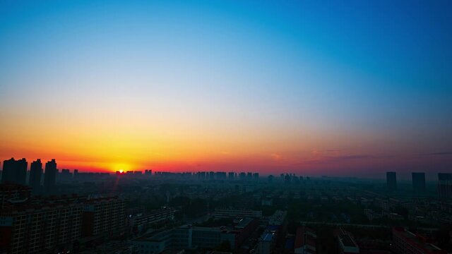 Panorama of Chinese city at sunrise with copy space, time-lapse