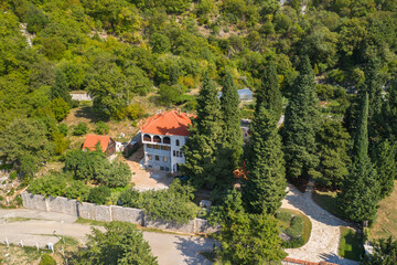 Fototapeta na wymiar Dulevo Convent on Mount Chelobrdo. View from above. Montenegro