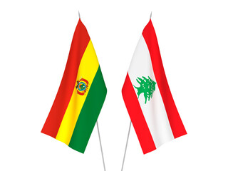 National fabric flags of Lebanon and Bolivia isolated on white background. 3d rendering illustration.