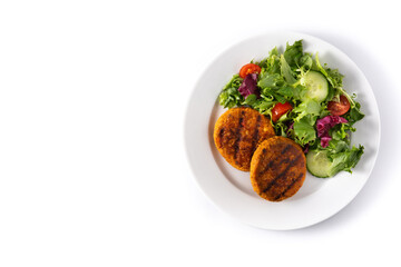 Delicious healthy chickpea burger and salad isolated on white background. Top view. Copy space