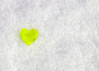concept Valentines Day: illuminating heart in the snow