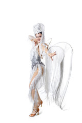 Obraz na płótnie Canvas Gorgeous. Beautiful young woman in carnival, stylish masquerade costume with feathers dancing on white studio background. Concept of holidays celebration, festive time, dance, party, fashion
