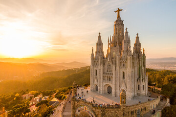 Picture of the temple of Tibidabo in Barcelona, Spain. captured at sunset. - obrazy, fototapety, plakaty