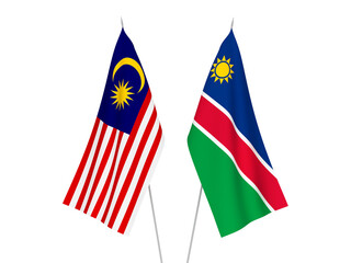 National fabric flags of Malaysia and Republic of Namibia isolated on white background. 3d rendering illustration.