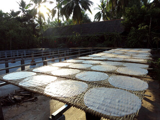 Drying rice paper crepes in a rice noodles factory in Can Tho, VIETNAM