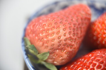 Farm fresh organic juicy strawberry served on ceramic bowl at breakfast