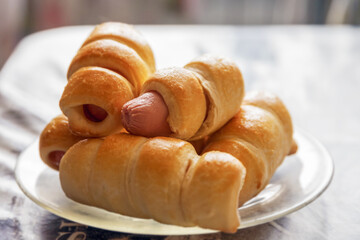 sausages in the dough hot dogs cooked at home, close-up