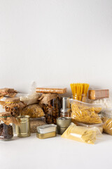Home food supplies, necessary food for the period of quarantine and isolation, the concept of stay at home, canned food and cereals, various pasta and flour, sugar and cookies, honey and coffee