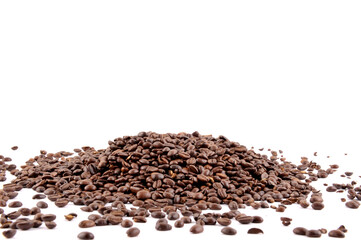 Roasted coffee beans against a white background.