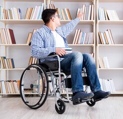 Disabled student studying in the library