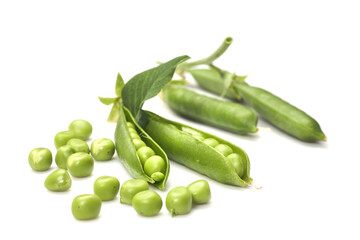 Pods of green peas with leaves isolated on white background