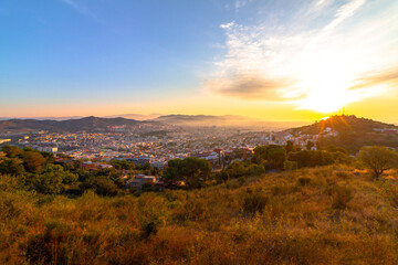 Panoramic picture of Barcelona city captured during sunrise.
