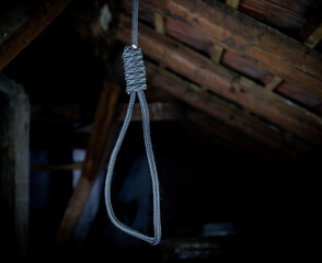 A noose hanging around his neck, a suicide committed, horrific scenes in a dark attic