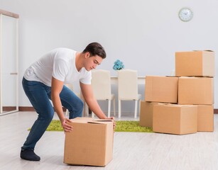 Man carrying boxes at home