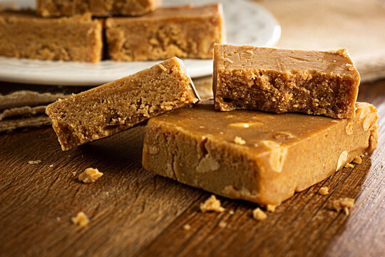 Pa&ccedil;oca, Closeup,  Brazilian Typical Peanut Candy on Wooden Table and a Plate