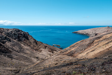 Arid mountains next to the sea