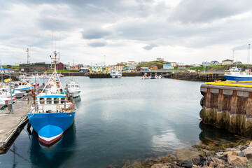 View of Stykkisholmur harbour in Northern Iceland on a cloudy summer day