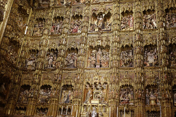 Life and Passion of Jesus and Mary in golden niches behind the altar of the Cathedral of Sevilla