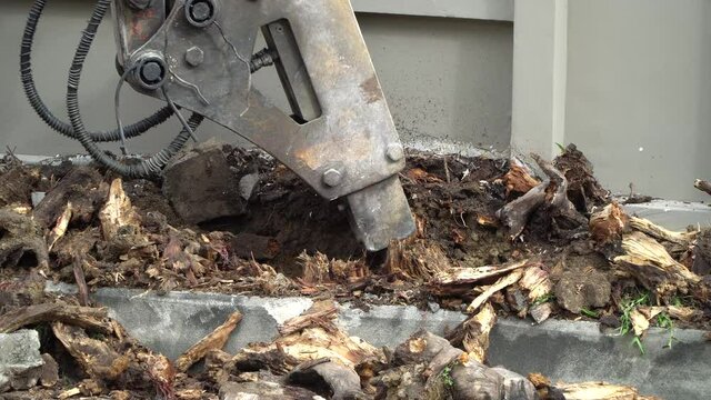 jackhammer has been drilled into the cement Road
