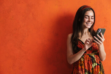 Attractive smiling young woman in summer dress