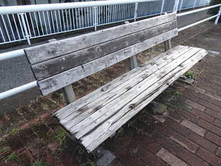 The old wooden bench on the street
