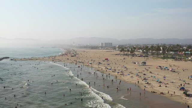 Panning Along Crowded Beach in Santa Monica
