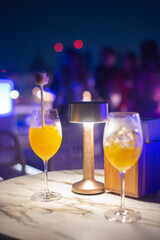 stylish desk lamp near beverage in the night