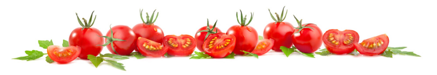 Collection of tomatoes and green leaves isolated on white background