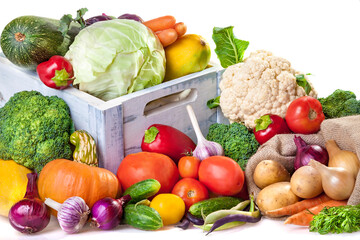 Fresh vegetables at your table. An assortment of organic vegetables: cucumbers, tomatoes, broccoli,...
